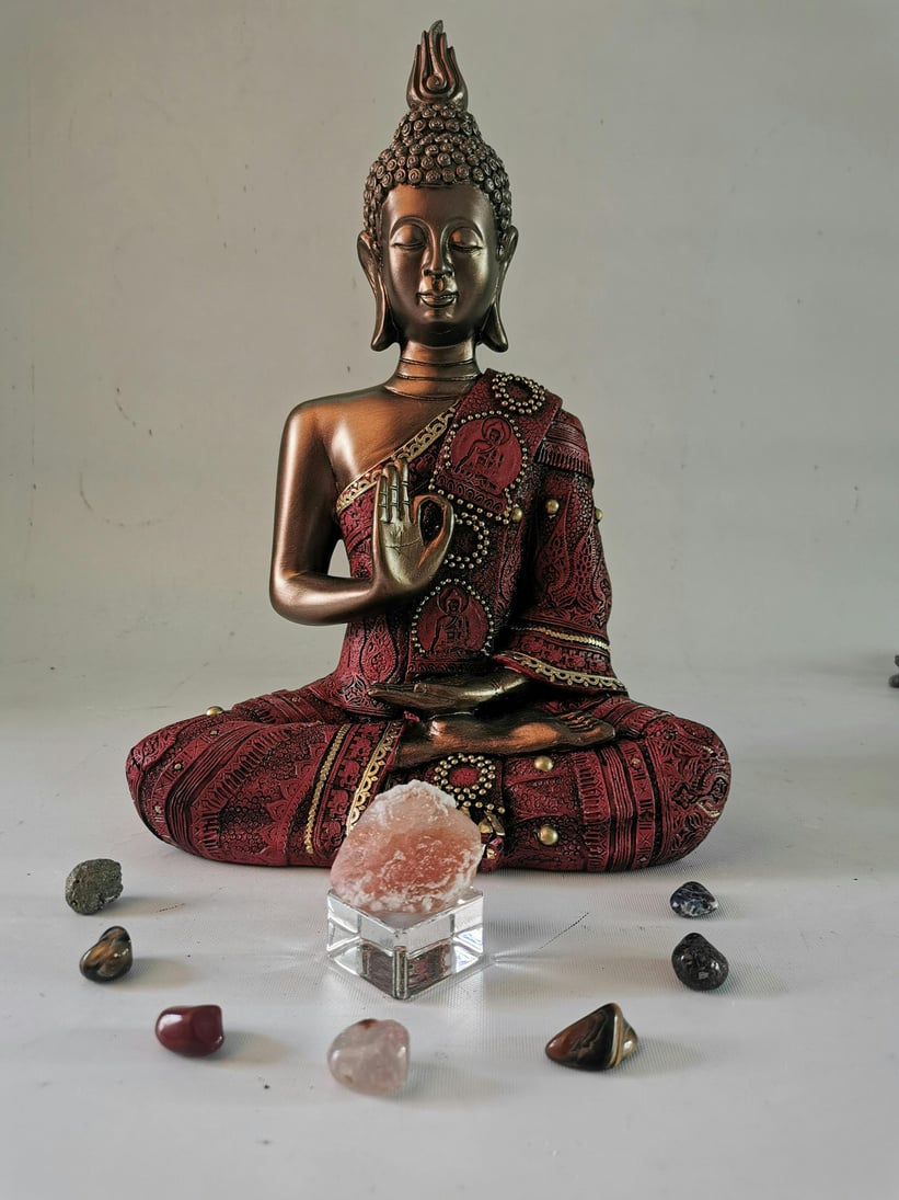 Buddha Statue and Precious Stones